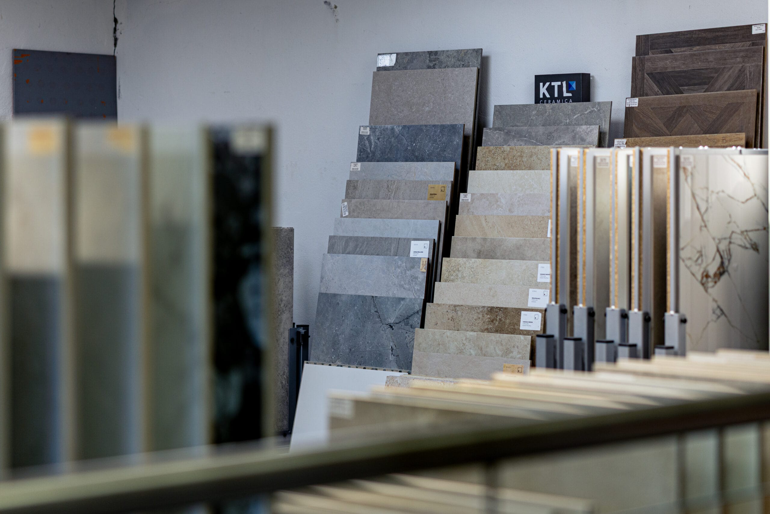 KTL Ceramics showroom with grey stone, marble and wood-effect large format porcelain tile samples