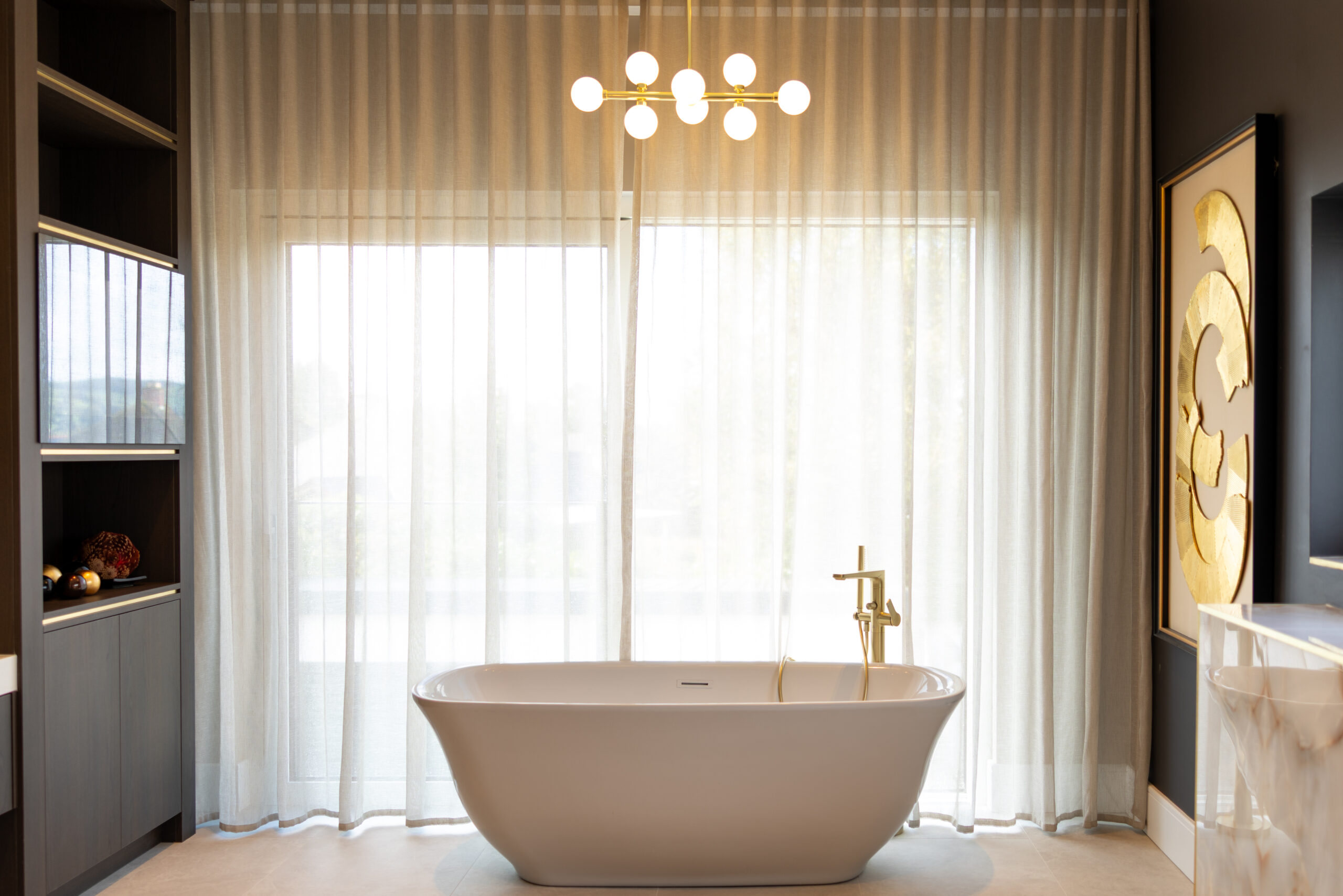 Freestanding bathtub and marble bathroom space