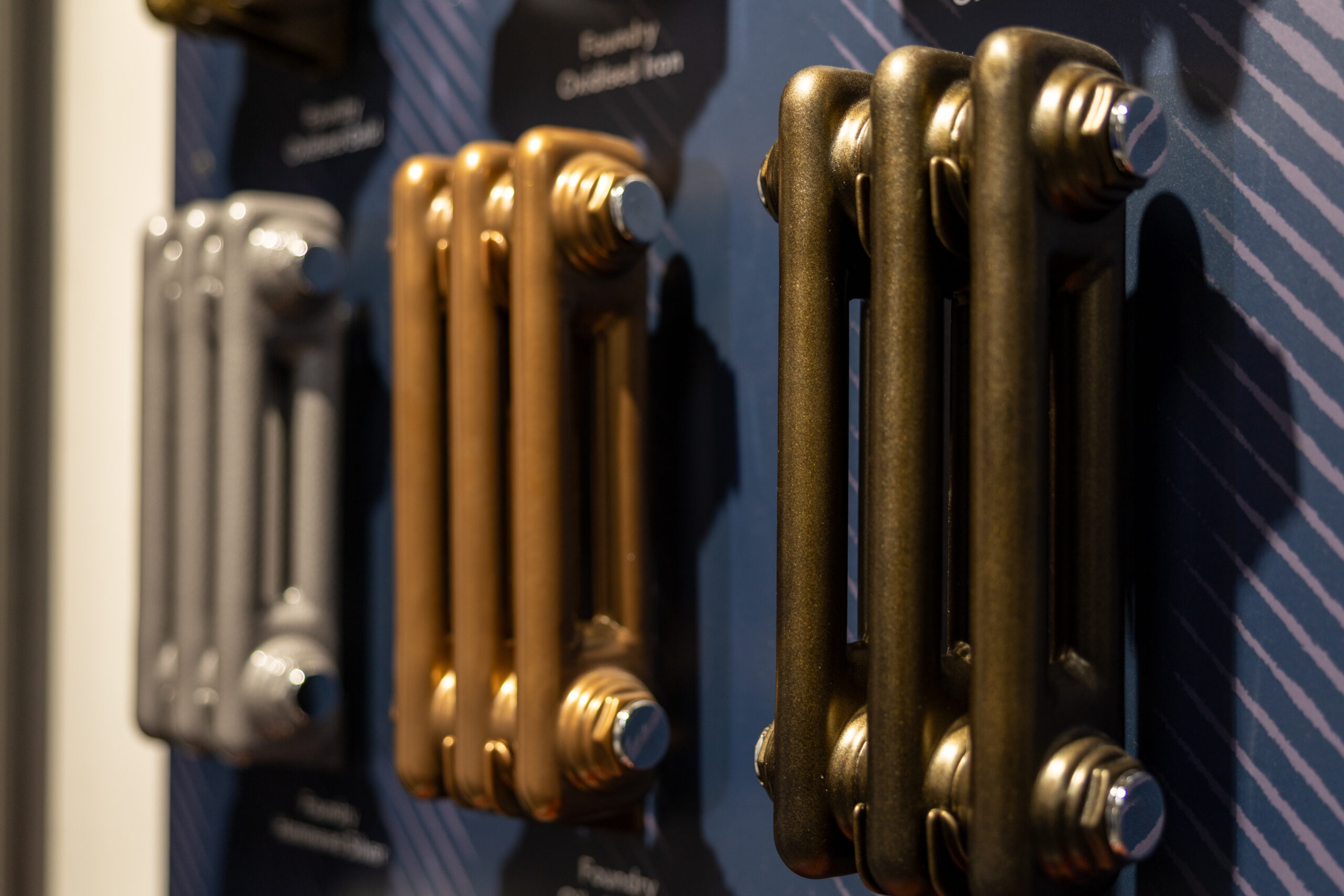 Cast-iron style radiator in a showroom setting