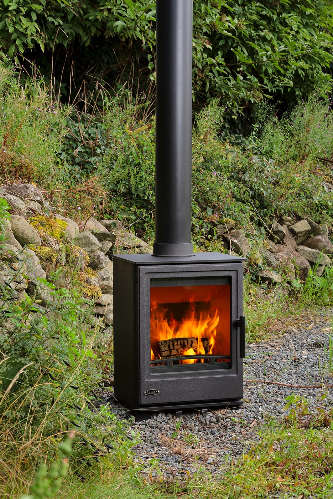 Atlantic Shore 5 stove lit and photographed outdoors in natural surroundings